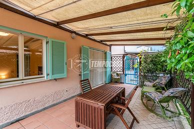 TRILOCALE CON GIARDINO E POSTO AUTO