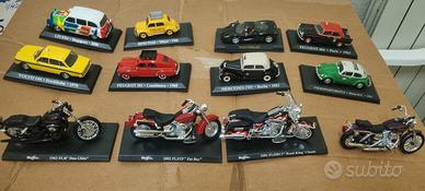 macchinine e moto da collezionismo con supporti 