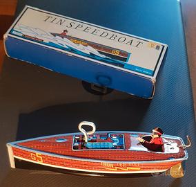 Motoscafo vintage in latta