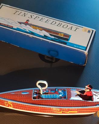 Motoscafo vintage in latta