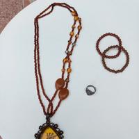 Lotto collana ragno con braccialetti ed anello 