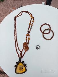 Lotto collana ragno con braccialetti ed anello 