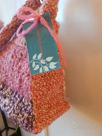 Borsa in maglia colore rosa  cipria 