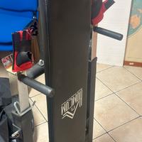 Panca con bilanciere manubri e pesi