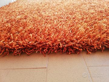 Tappeto a pelo lungo arancione
