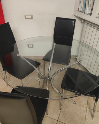 Tavolo rotondo piano in vetro