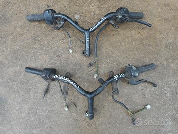 Manubrio e comando devio luci malaguti f10 f12