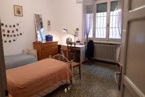 Posto letto in ampia stanza in condivisione