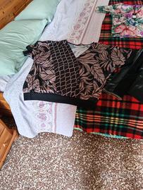 Giacca pelle sintetica nera e bluse