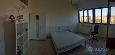 Camera singola con letto a due piazze e bagno priv