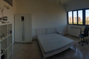 Camera singola con letto a due piazze e bagno priv