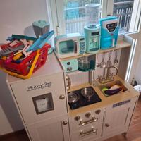 Cucina, passeggino e tanti altri giochi