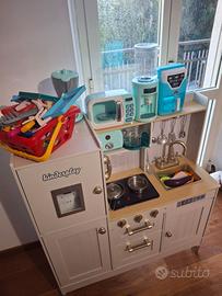 Cucina, passeggino e tanti altri giochi