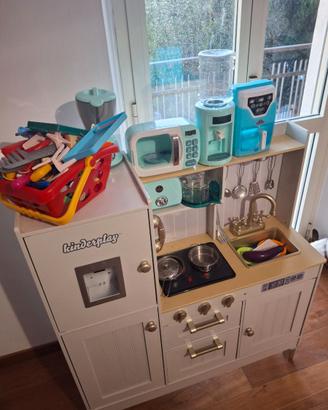 Cucina, passeggino e tanti altri giochi