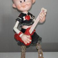 statua caricatura chitarrista musicista punk rock