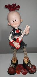 statua caricatura chitarrista musicista punk rock