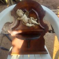 coppia di angioletti con base in legno