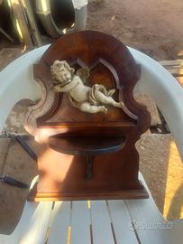 coppia di angioletti con base in legno