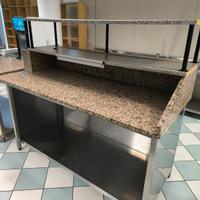 Banco in inox con piano in granito