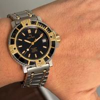 Orologio Lucien Rochat con lunetta in oro 18 kt