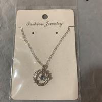 Collana con cerchio blu, brillantini e stellina