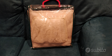 Scaldapiedi vibrante a pile.Lana color panna,nuovo