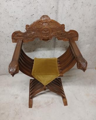 Poltrona savonarola in legno intagliato