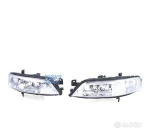 FARI PER OPEL VECTRA B 99-02 FONDO CROMATO