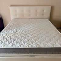 Letto a cassettone con testata in ecopelle