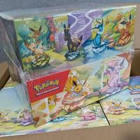 carte pokemon - min tin evoluzioni prismatiche