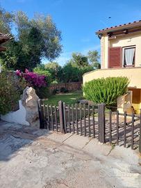Cannigione appartamento con giardino