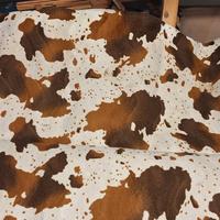 Tessuto eco pelliccia disegno Mucca