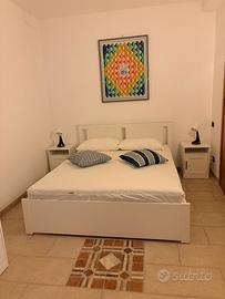 Camera da letto bianca