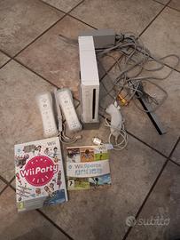 nintendo wii con telecomandi e giochi