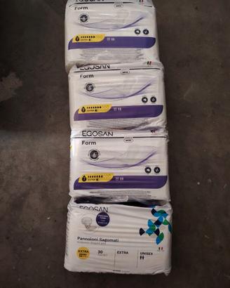 Comfezione pannoloni unisex