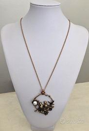 Collana in ottone con medaglione usignoli