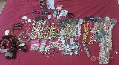 lotto 100 pezzi bigiotteria nuova