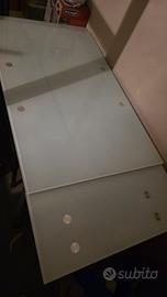 Tavolo allungabile in vetro e acciaio 