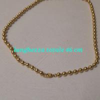 collana in metallo colore oro 