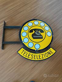 Insegna bifacciale smaltata anni '50.