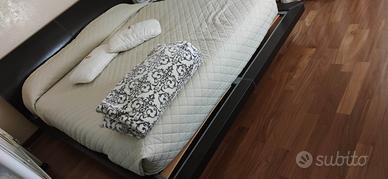 letto matrimoniale con supporti comodini con led