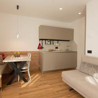 Vacanze estive a pinzolo: bilocale con giardino