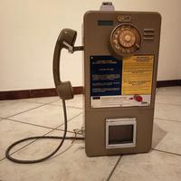Telefono a gettoni cabina