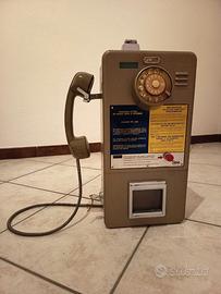Telefono a gettoni cabina