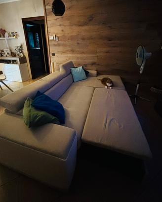 Divano letto con penisola contenitrice