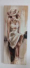 2 quadri donna  più un quadro candele