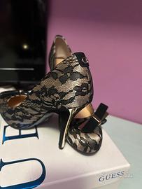 Tacchi Guess