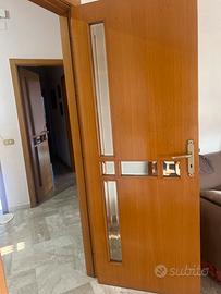 Porte in legno con inserti in vetro specchiato