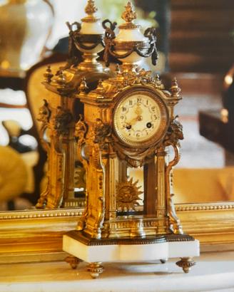 OROLOGIO e  CANDELABRI
