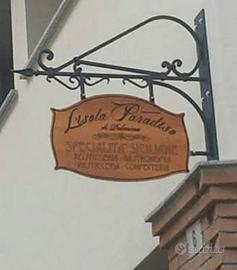 insegna in ferro  battuto 